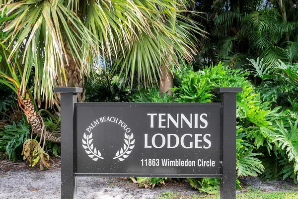 a sign broad on the side of the road