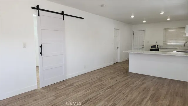 a view of kitchen with wooden floor