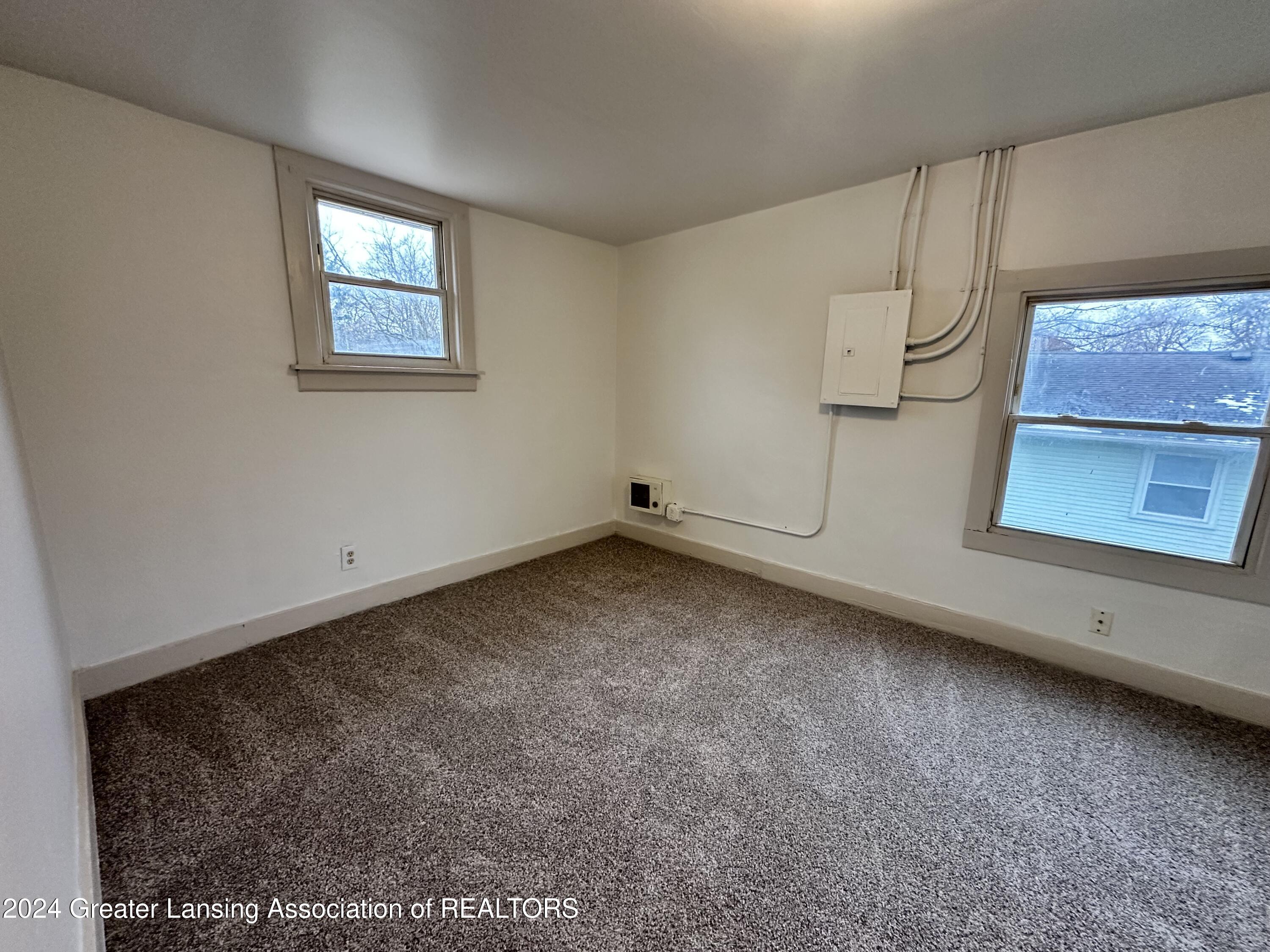 2417 West Jolly Road Lansing, MI 48911 - Photo 7 of 8 Unit 2 Bedroom
