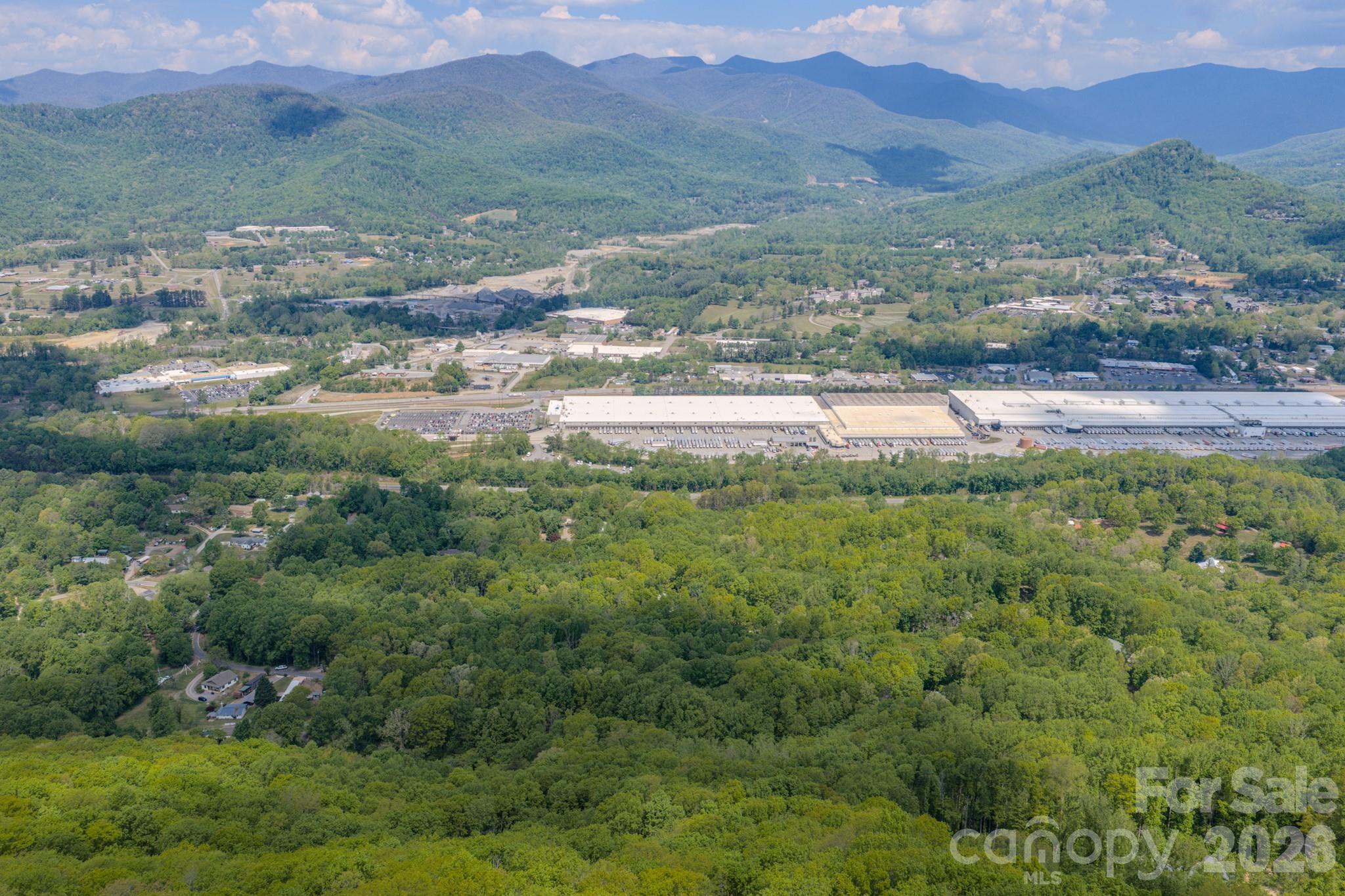 259 Mockingbird Road, Unit 1 Swannanoa, NC 28778 - Photo 7 of 25 a view of a town with mountains in the background