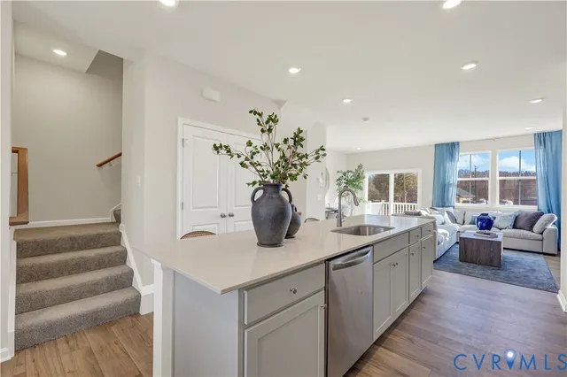 a view of living room with furniture and potted plant