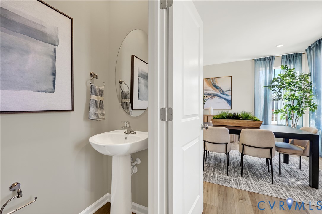 6047 Blue Iris Road Richmond, VA 23225 - Photo 22 of 27 a bathroom with a sink and a mirror