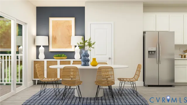 a dining room with furniture and a window