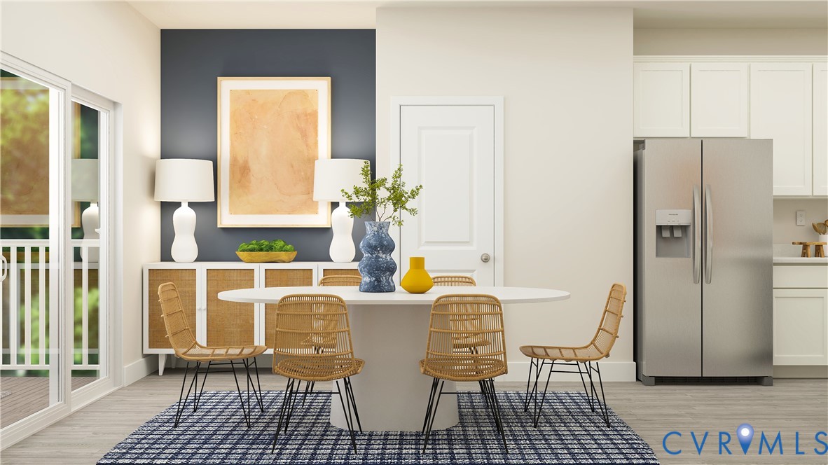 6047 Blue Iris Road Richmond, VA 23225 - Photo 3 of 19 a dining room with furniture and a window
