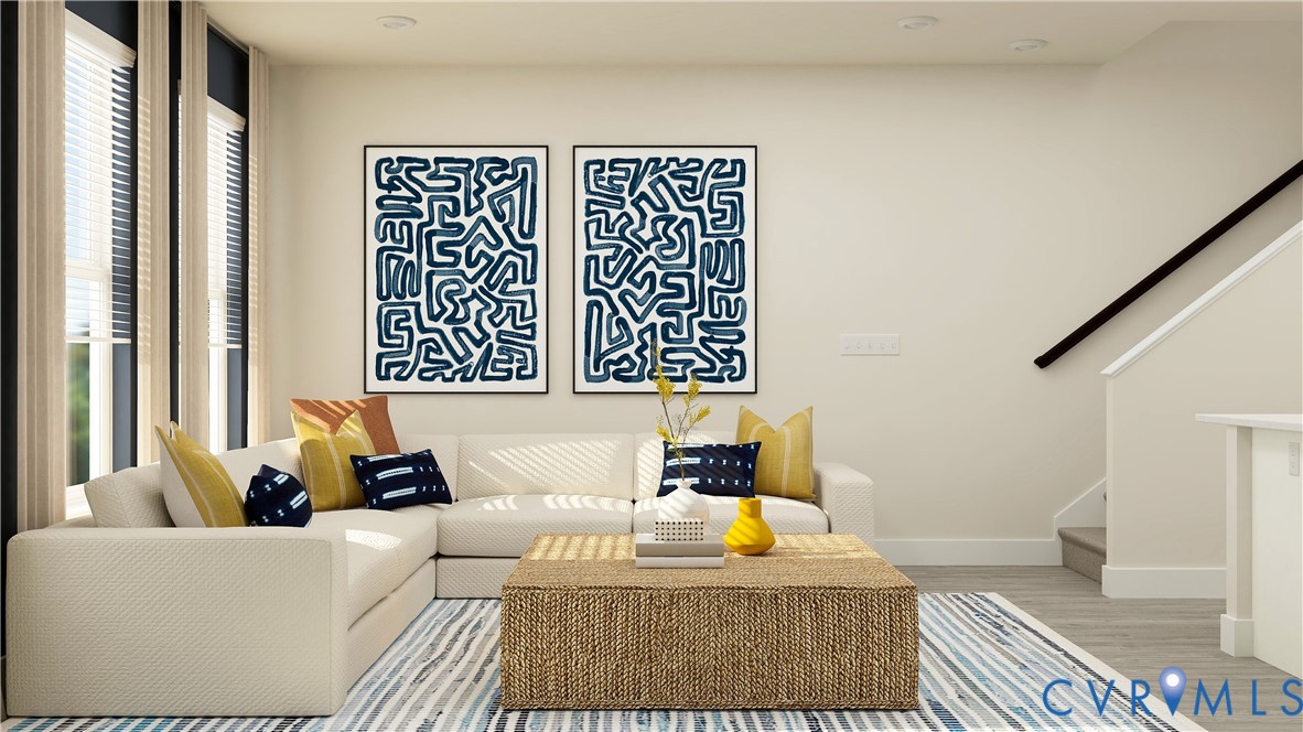 6047 Blue Iris Road Richmond, VA 23225 - Photo 6 of 19 a living room with a couch and a table