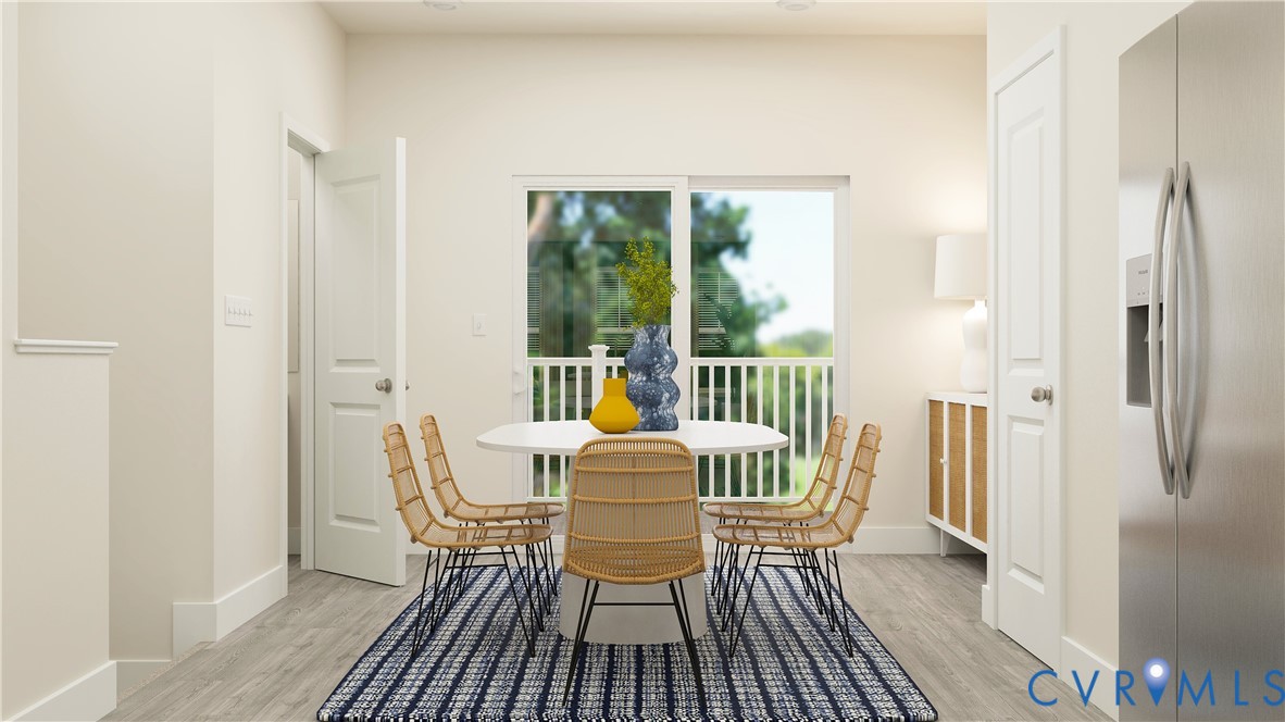 6047 Blue Iris Road Richmond, VA 23225 - Photo 7 of 19 a dining room with furniture window and outside view