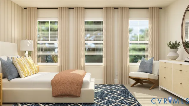 a bedroom with furniture and windows