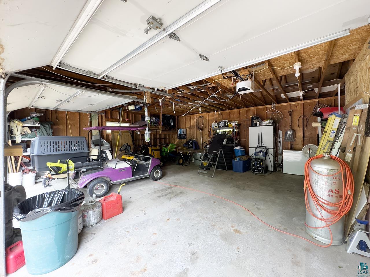 1198 West Mink Road Cotton, MN 55724 - Photo 19 of 23 Garage with a garage door opener