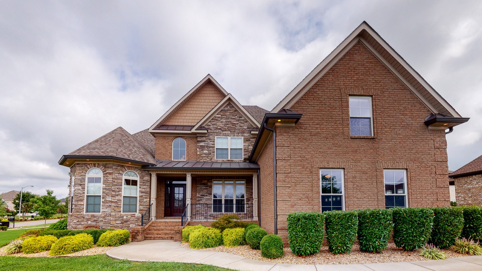 701 Stone Mill Circle Murfreesboro, TN 37130 - Photo 1 of 42 a front view of a house with garden