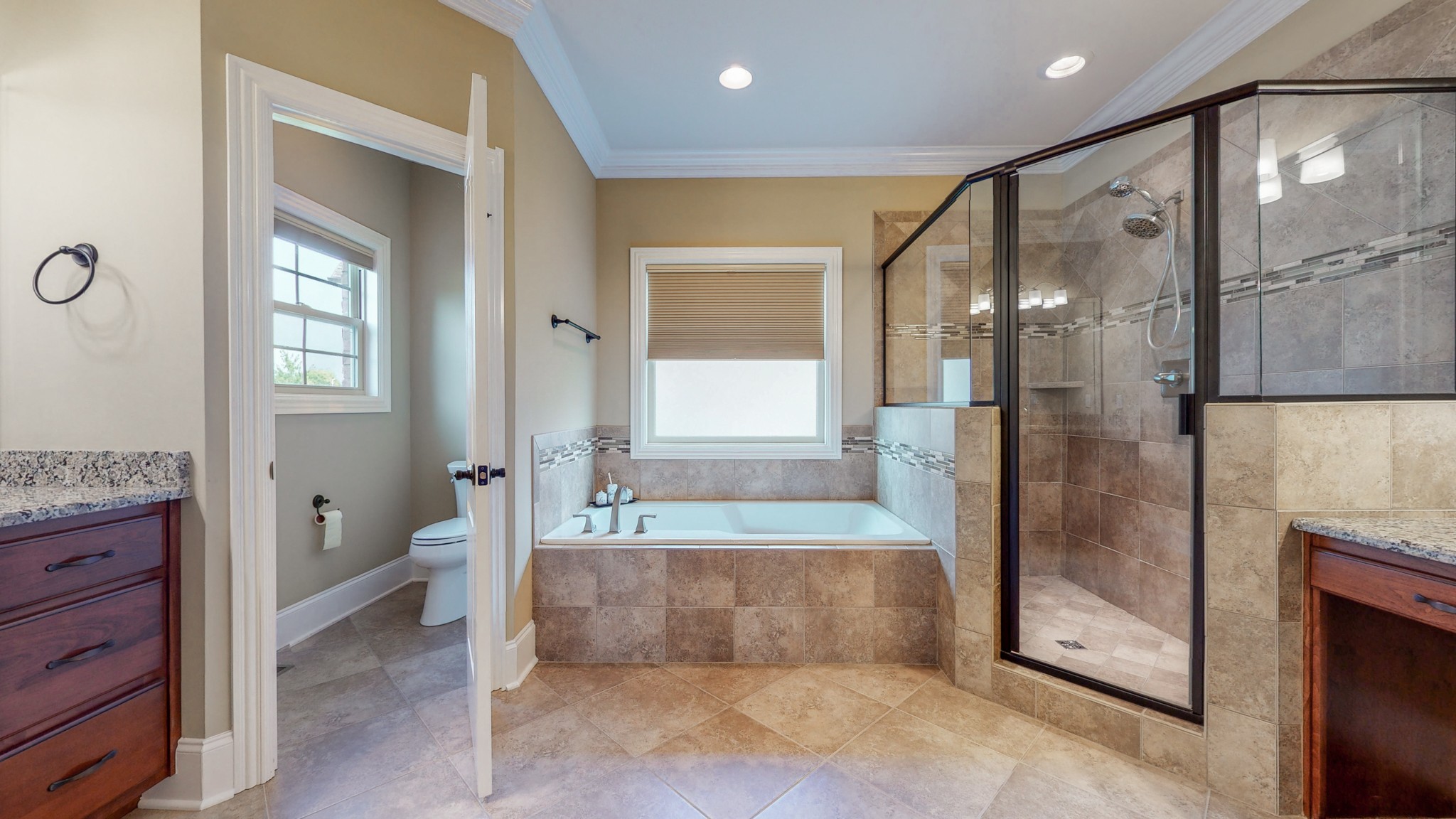 701 Stone Mill Circle Murfreesboro, TN 37130 - Photo 11 of 42 a bathroom with a granite countertop bathtub shower sink and mirror