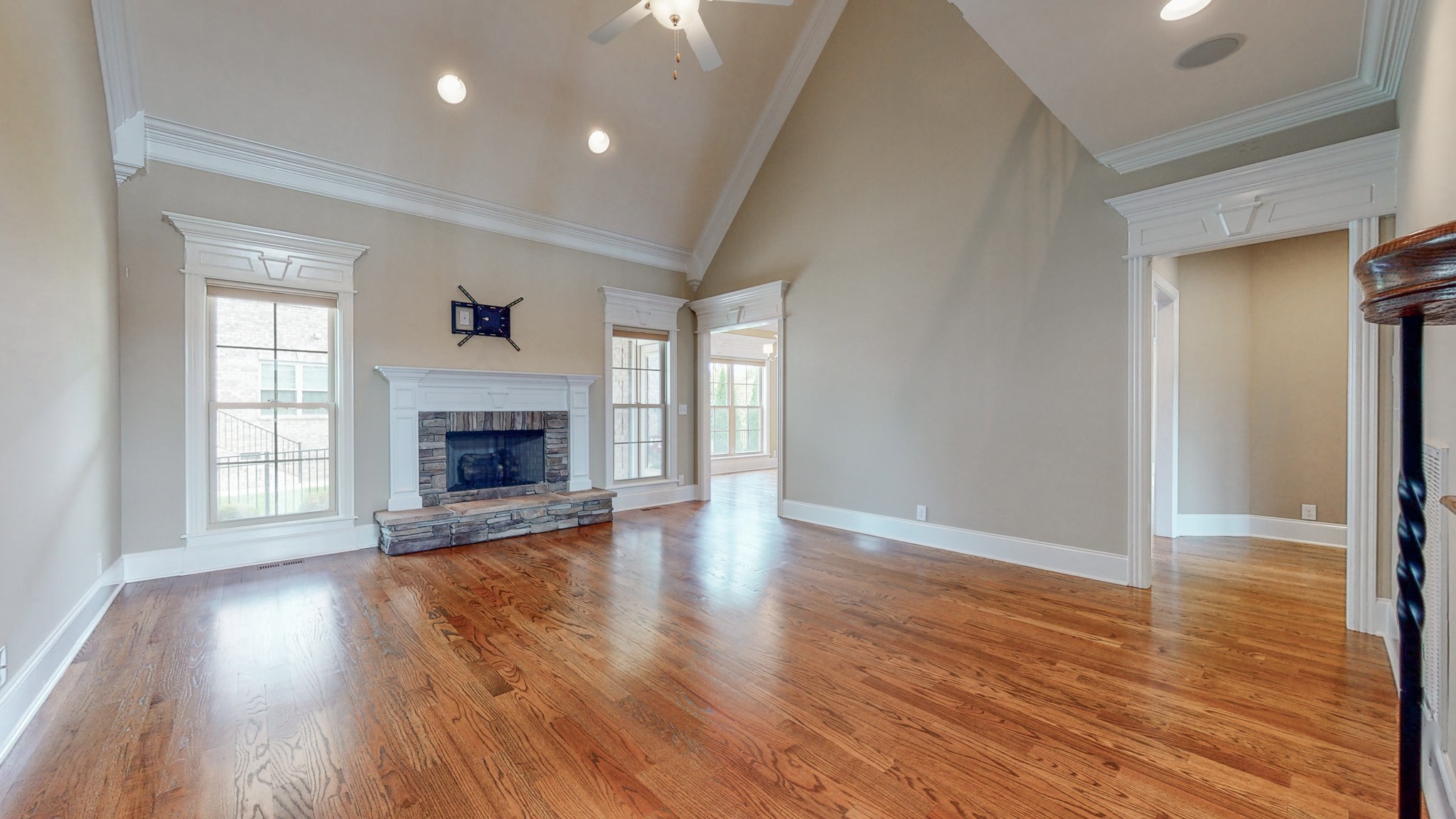 701 Stone Mill Circle Murfreesboro, TN 37130 - Photo 14 of 42 an empty room with wooden floor and fireplace