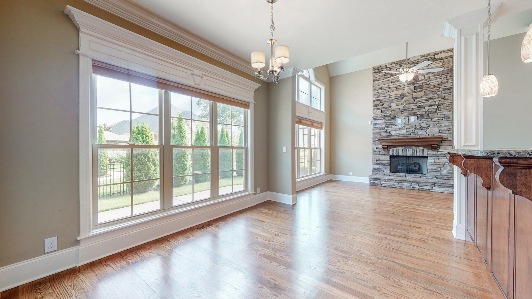 701 Stone Mill Circle Murfreesboro, TN 37130 - Photo 17 of 42 a view of a livingroom with wooden floor fireplace and windows