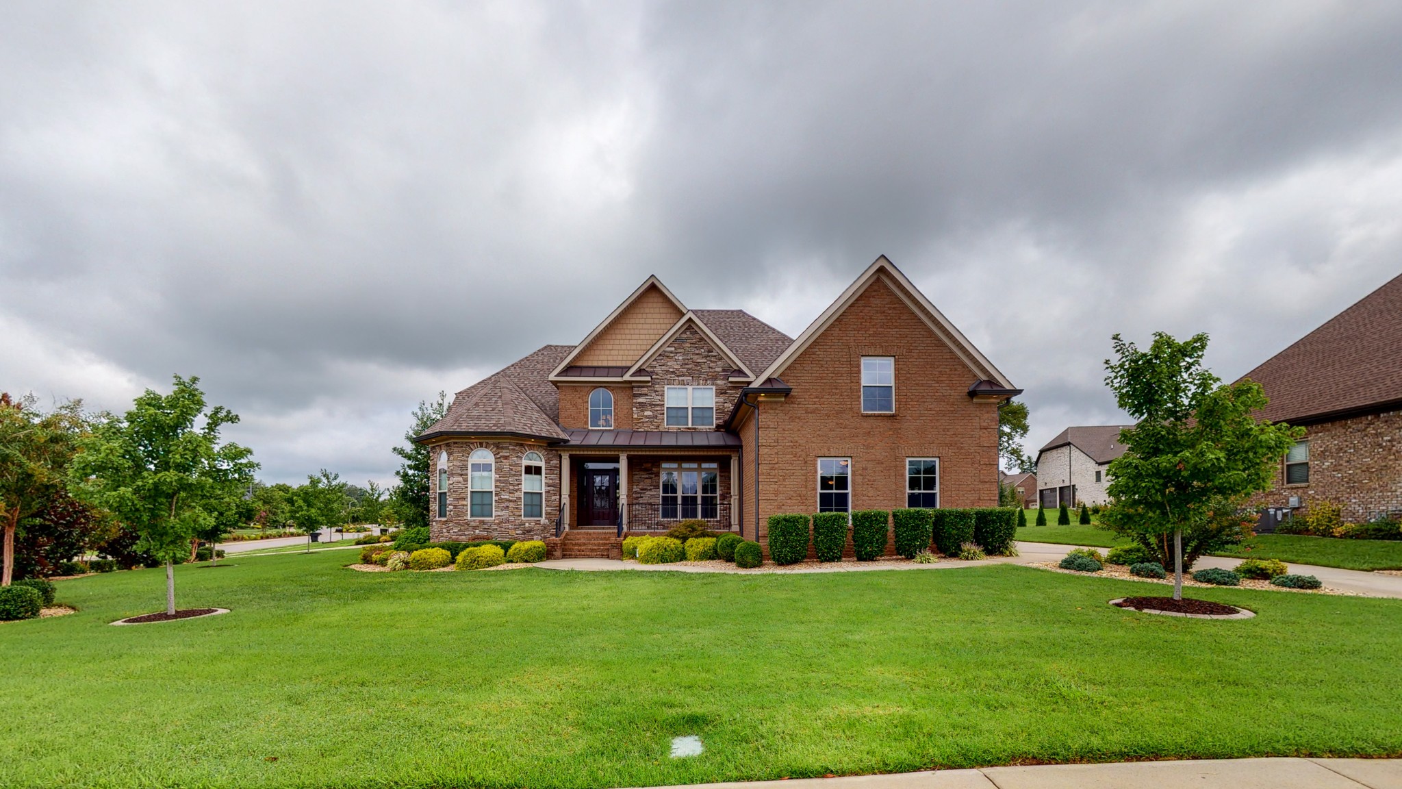 701 Stone Mill Circle Murfreesboro, TN 37130 - Photo 2 of 42 a front view of a house with a yard