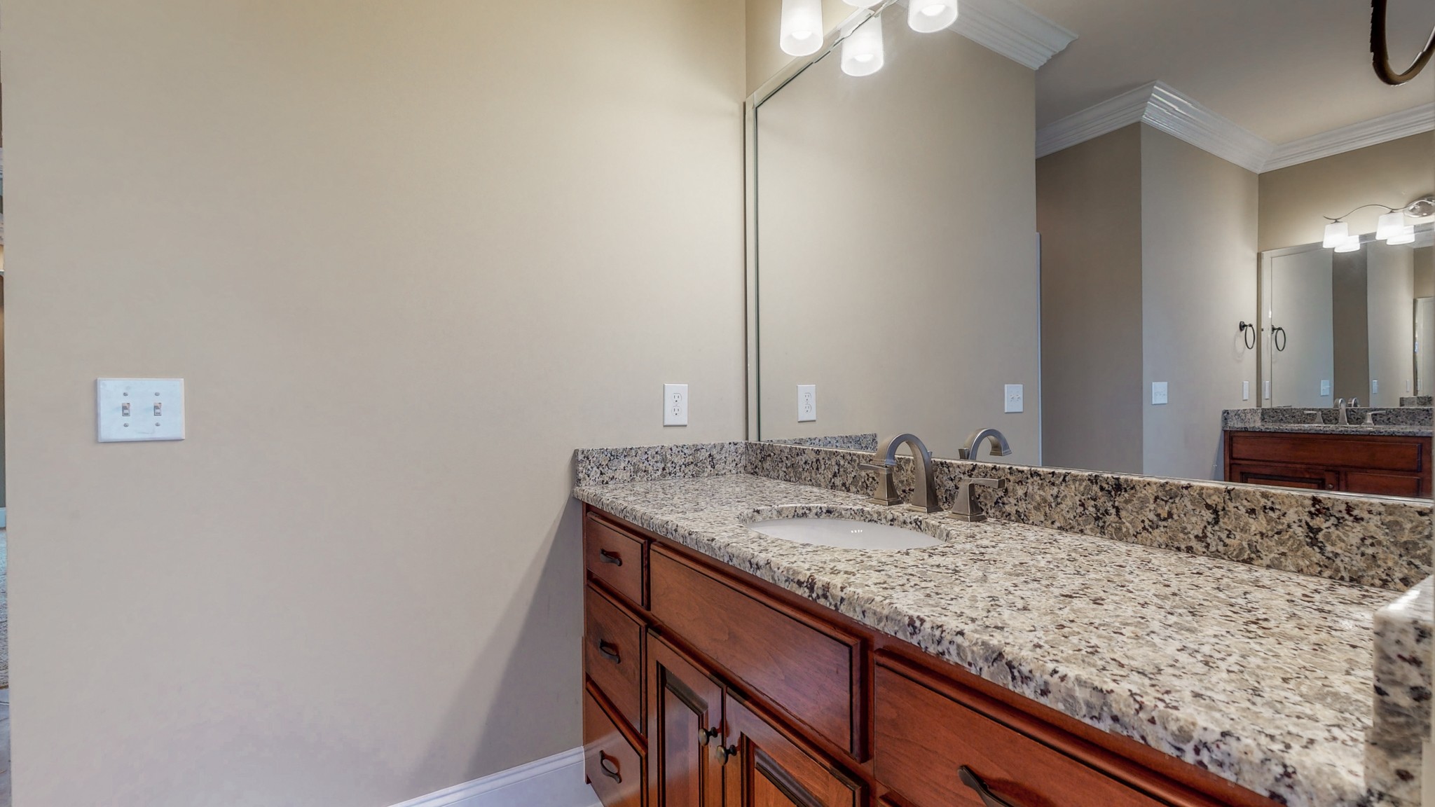 701 Stone Mill Circle Murfreesboro, TN 37130 - Photo 33 of 42 a bathroom with a granite countertop sink and a mirror