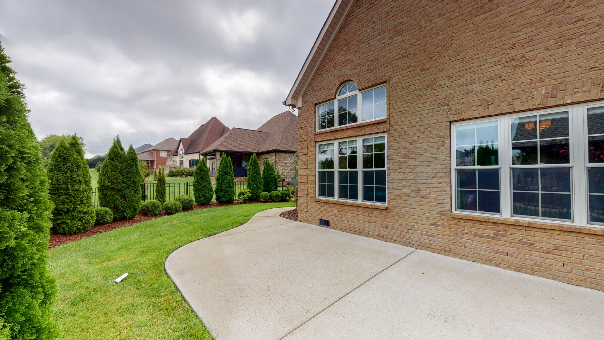701 Stone Mill Circle Murfreesboro, TN 37130 - Photo 38 of 42 a front view of a house with a yard and garage