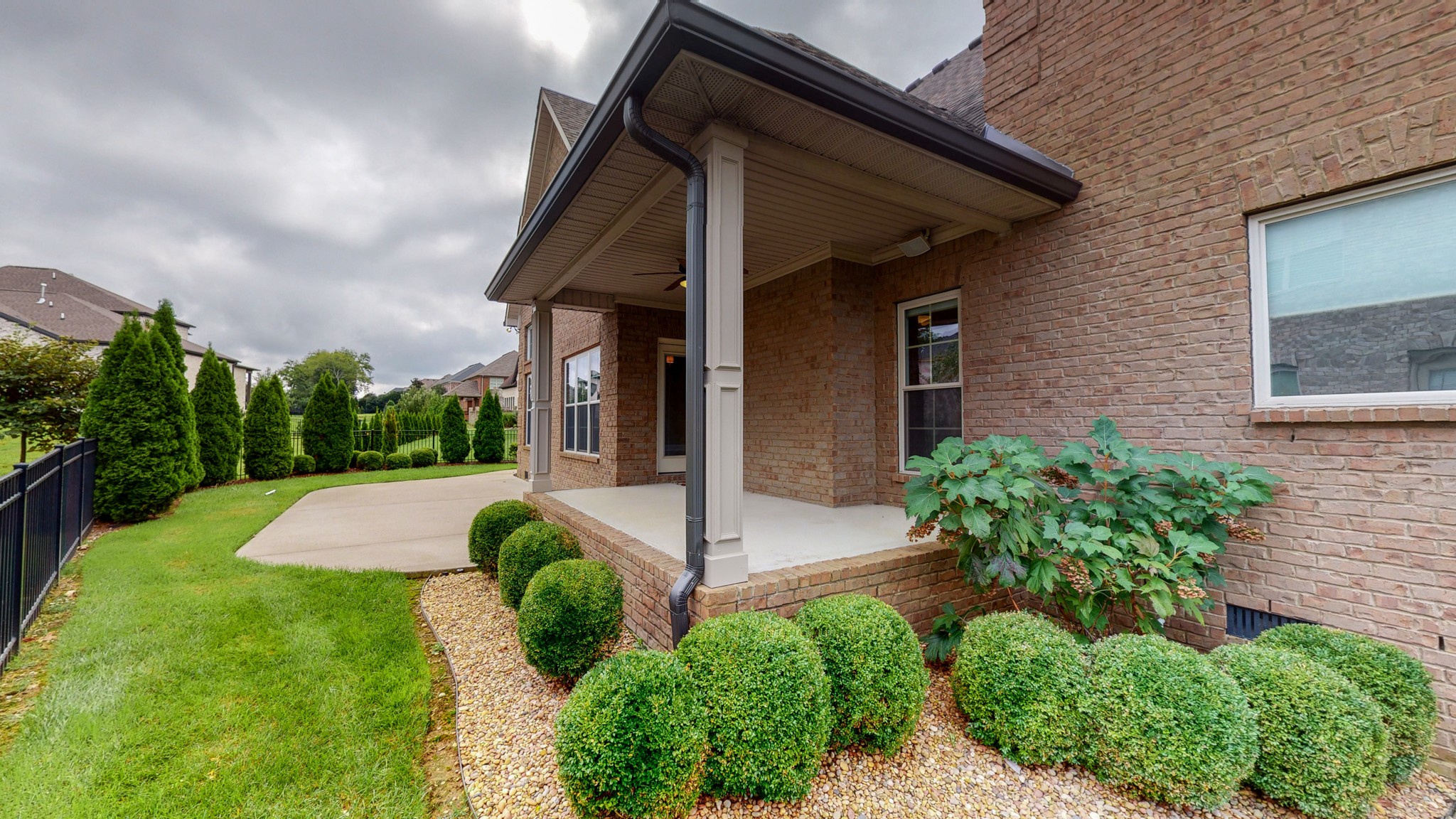 701 Stone Mill Circle Murfreesboro, TN 37130 - Photo 40 of 42 a view of yellow house with potted plants