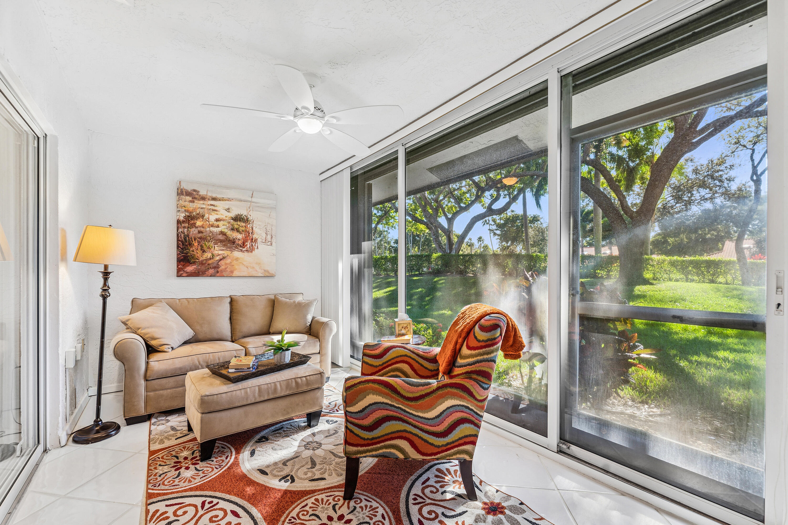 6348 Pointe Pleasant Circle Delray Beach, FL 33484 - Photo 22 of 40 a living room with furniture and a window