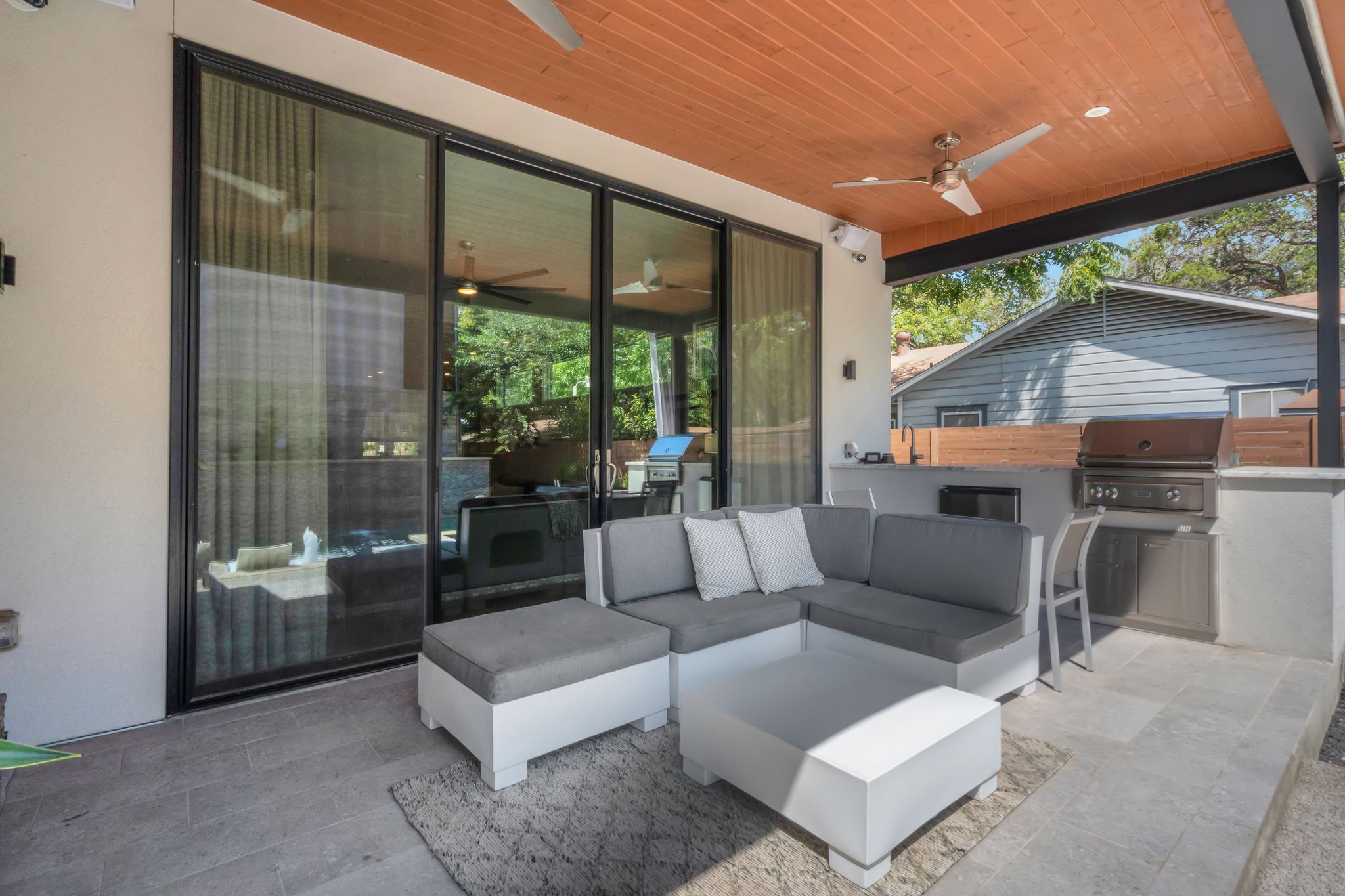 809 Bouldin Avenue Austin, TX 78704 - Photo 26 of 39 View of patio / terrace featuring ceiling fan and an outdoor kitchen and area to lounge