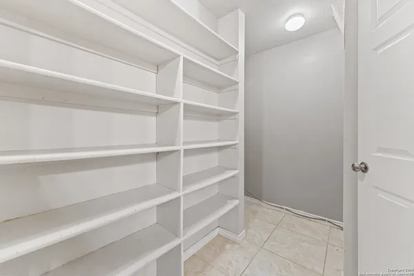 a view of an empty walk in closet