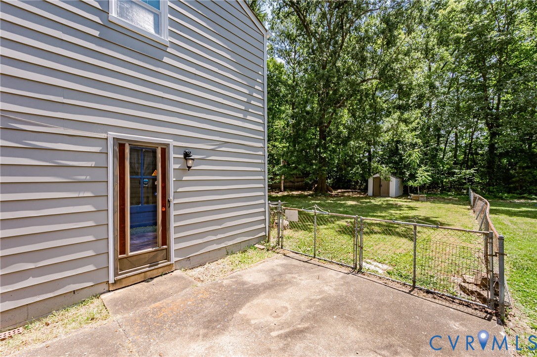 709 Deter Road Richmond, VA 23225 - Photo 36 of 38 Gray horizontal siding with a window and exterior
