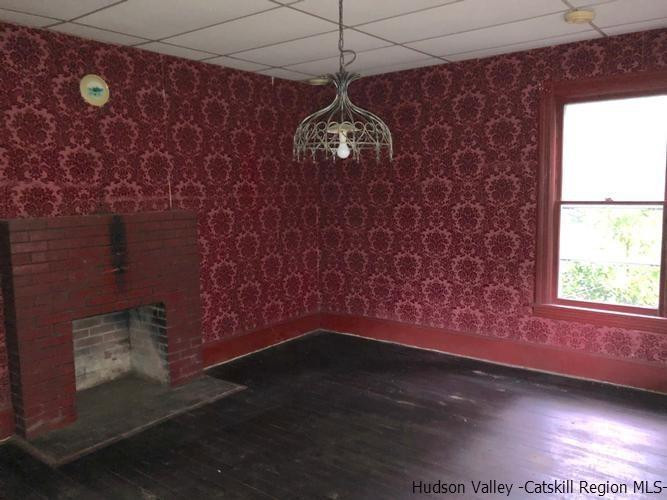 1135 Creek Locks Road Rosendale, NY 12411 - Photo 4 of 8 a view of an empty room with a window