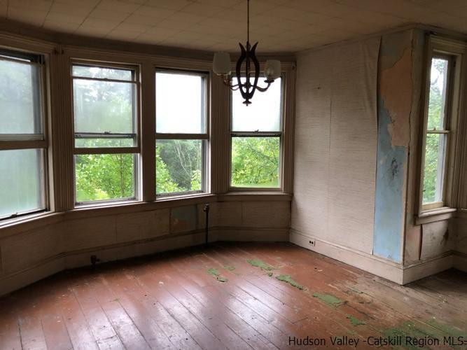 1135 Creek Locks Road Rosendale, NY 12411 - Photo 5 of 8 a view of an empty room with a window