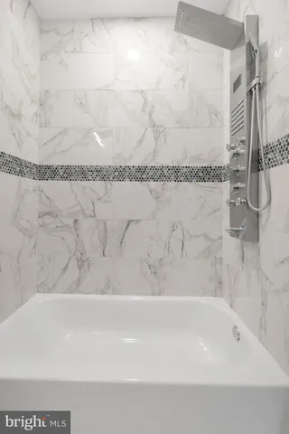 a bathroom with a bathtub