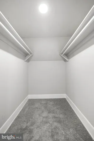 a view of a room with racks on the wall