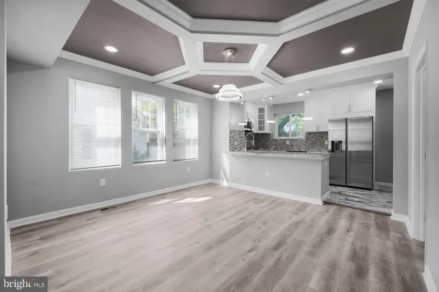 a view of a kitchen and a window