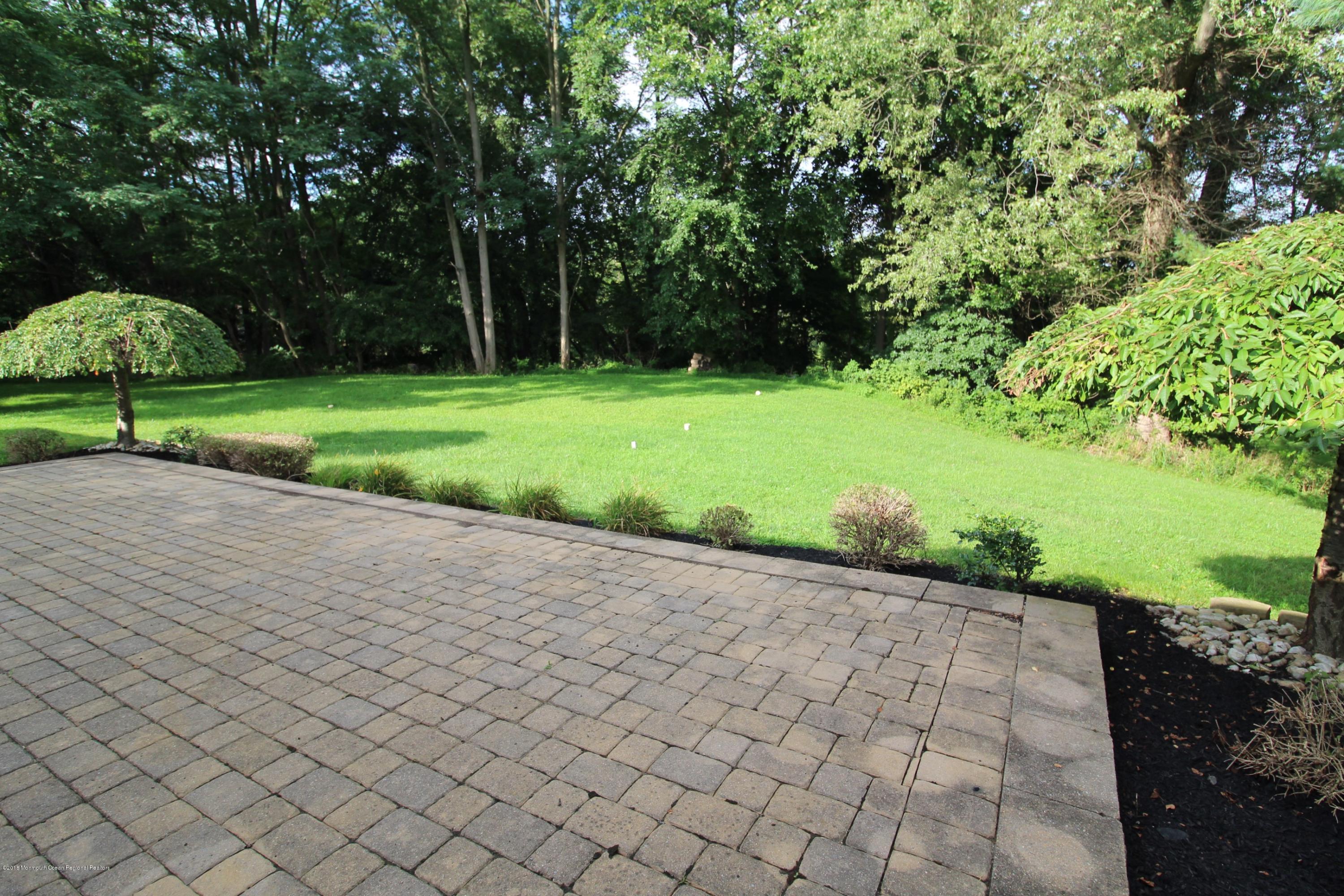 134 Conover Road Morganville, NJ 07751 - Photo 19 of 24 a view of a park with large trees