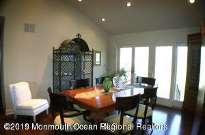 134 Conover Road Morganville, NJ 07751 - Photo 21 of 24 a view of a dining room with furniture window and wooden floor