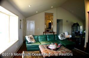 134 Conover Road Morganville, NJ 07751 - Photo 23 of 24 a living room with furniture and a potted plant