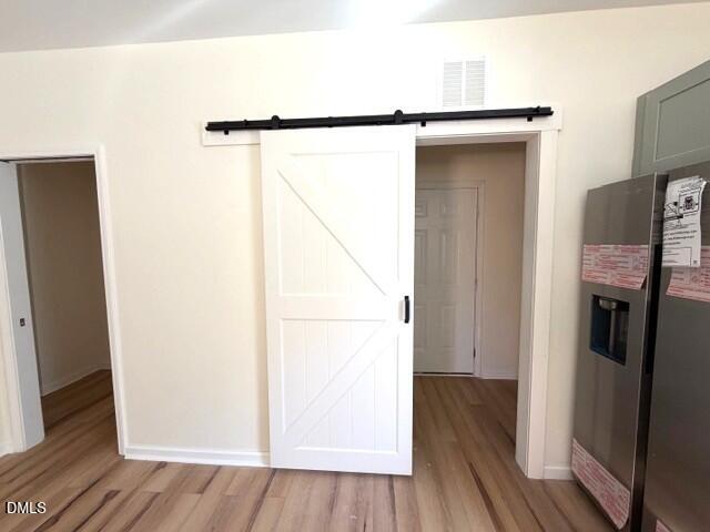 1009 Ridge Rock Road Raleigh, NC 27610 - Photo 1 of 24 Barn Door to the Laundry/Mudroom!