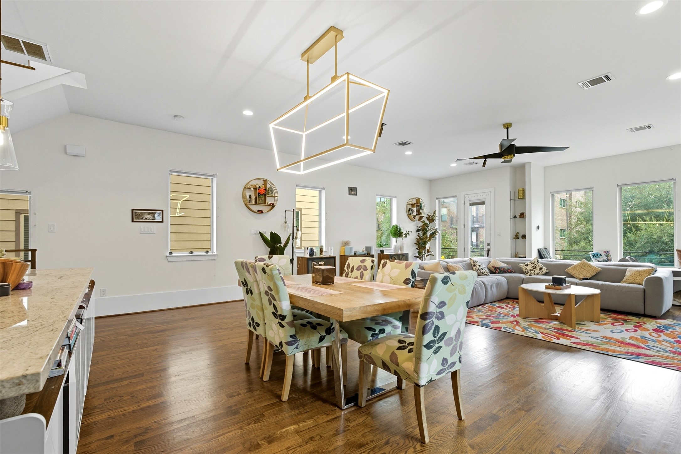215 Avondale Street Houston, TX 77006 - Photo 15 of 42 a view of a dining room with furniture window and wooden floor