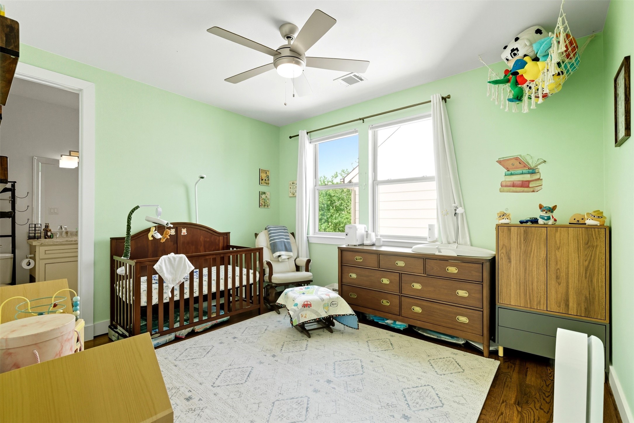 215 Avondale Street Houston, TX 77006 - Photo 29 of 42 a bedroom with a bed and a couch