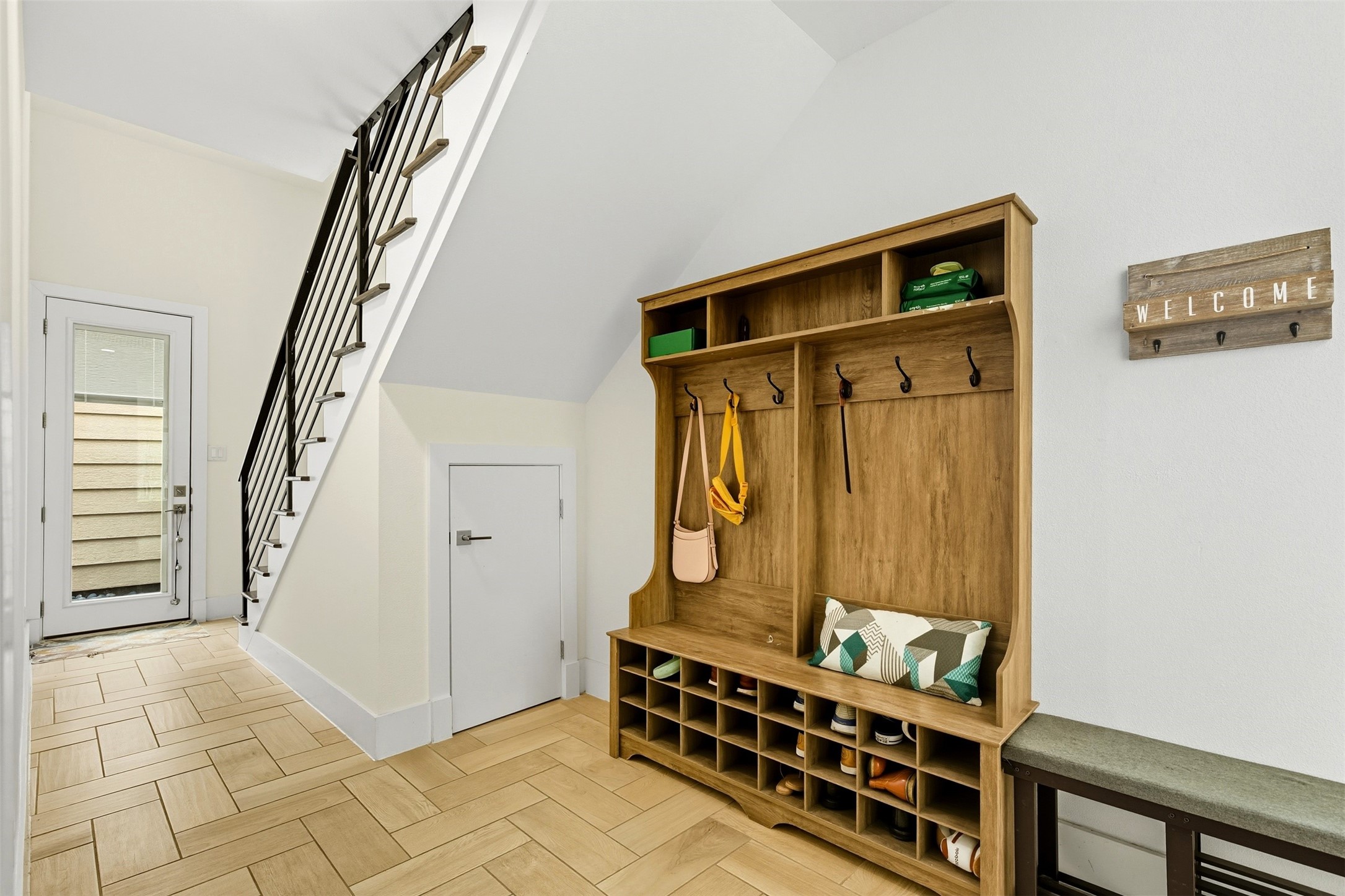 215 Avondale Street Houston, TX 77006 - Photo 3 of 42 a view of front door with furniture and stairs