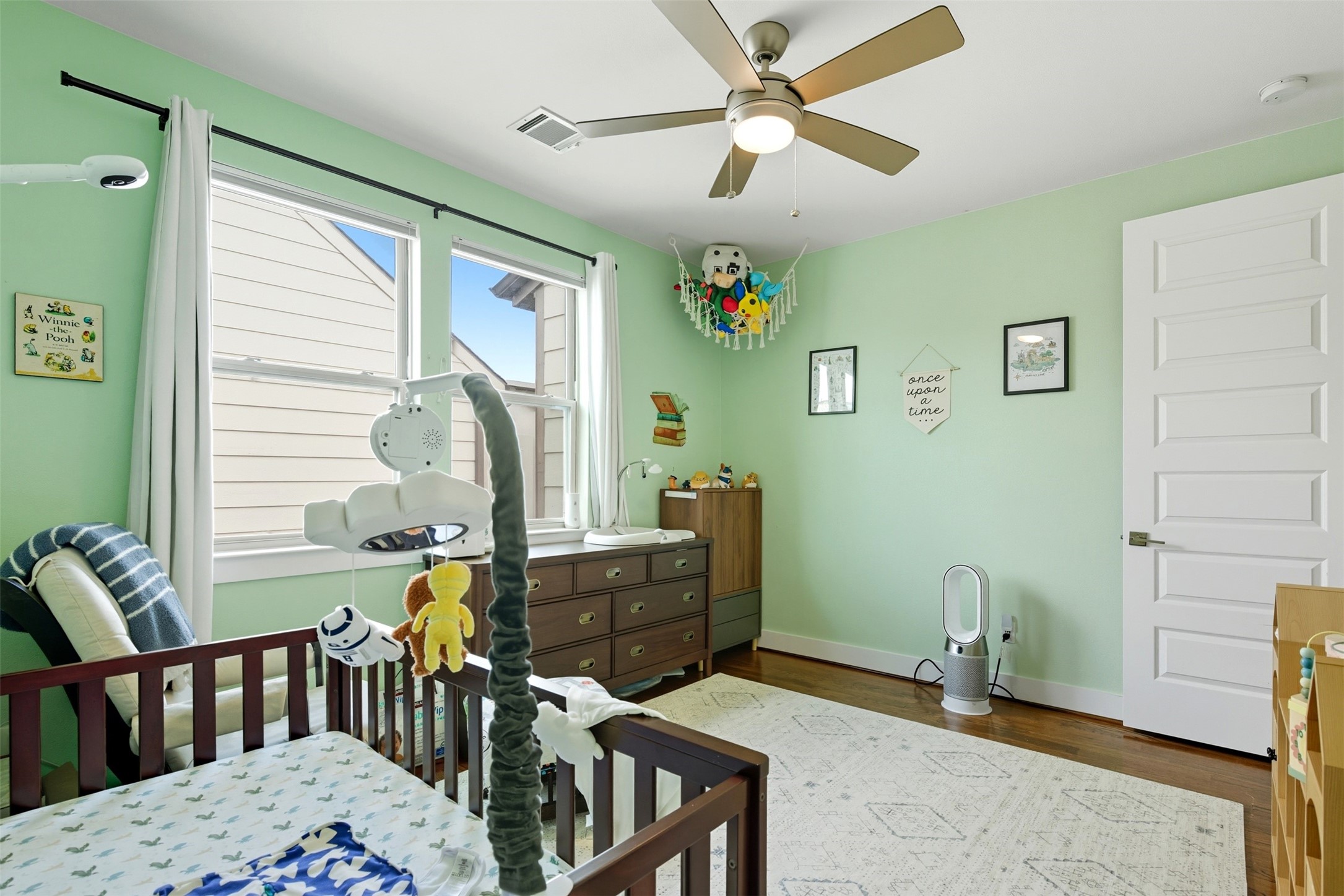 215 Avondale Street Houston, TX 77006 - Photo 31 of 42 a bedroom with furniture and a window