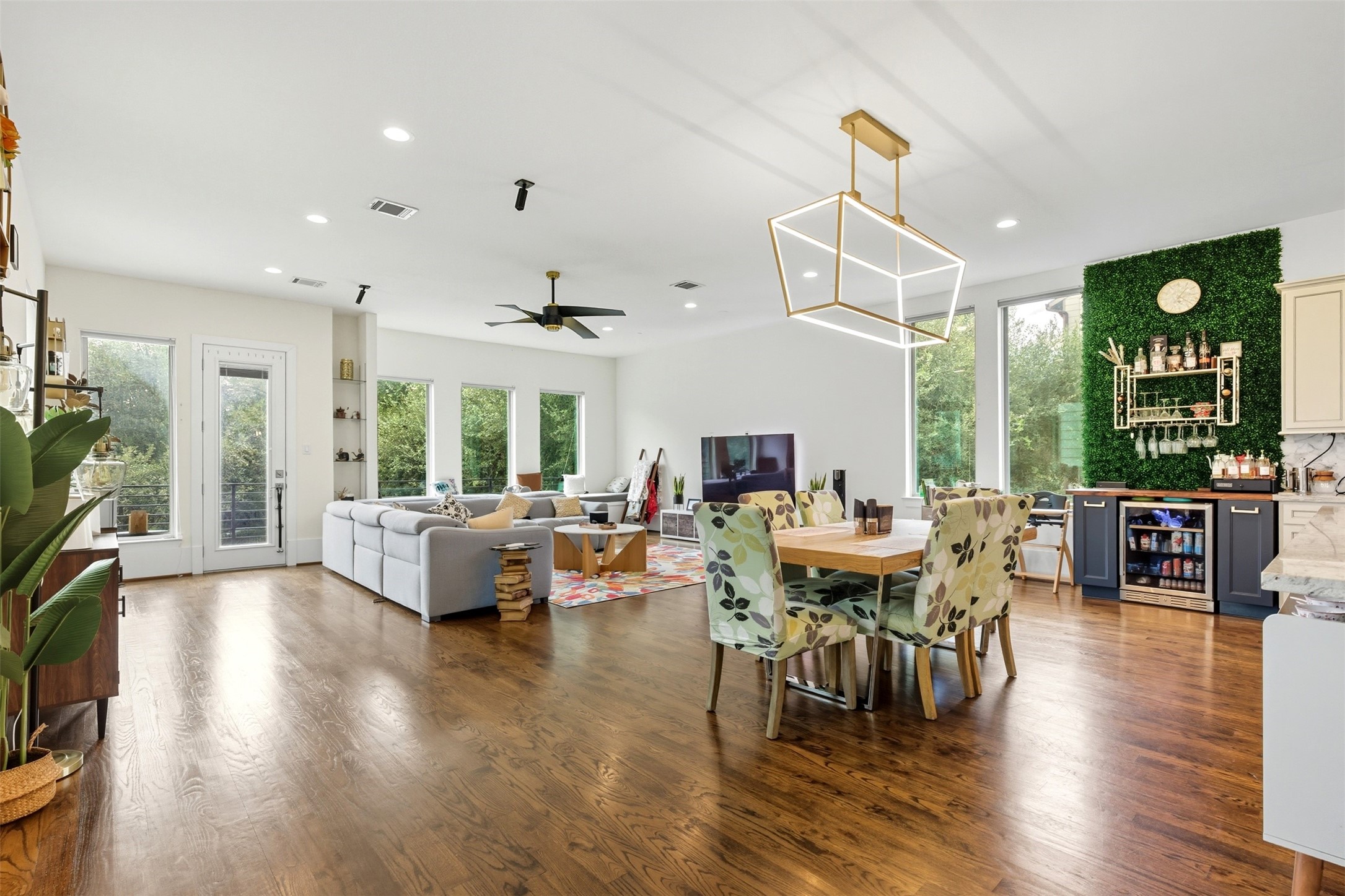 215 Avondale Street Houston, TX 77006 - Photo 8 of 42 a living room with fireplace furniture and a wooden floor