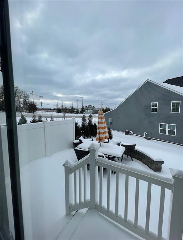 6004 Elm Road Gibsonia, PA 15044 - Photo 2 of 2 a living room with furniture and a flat screen tv