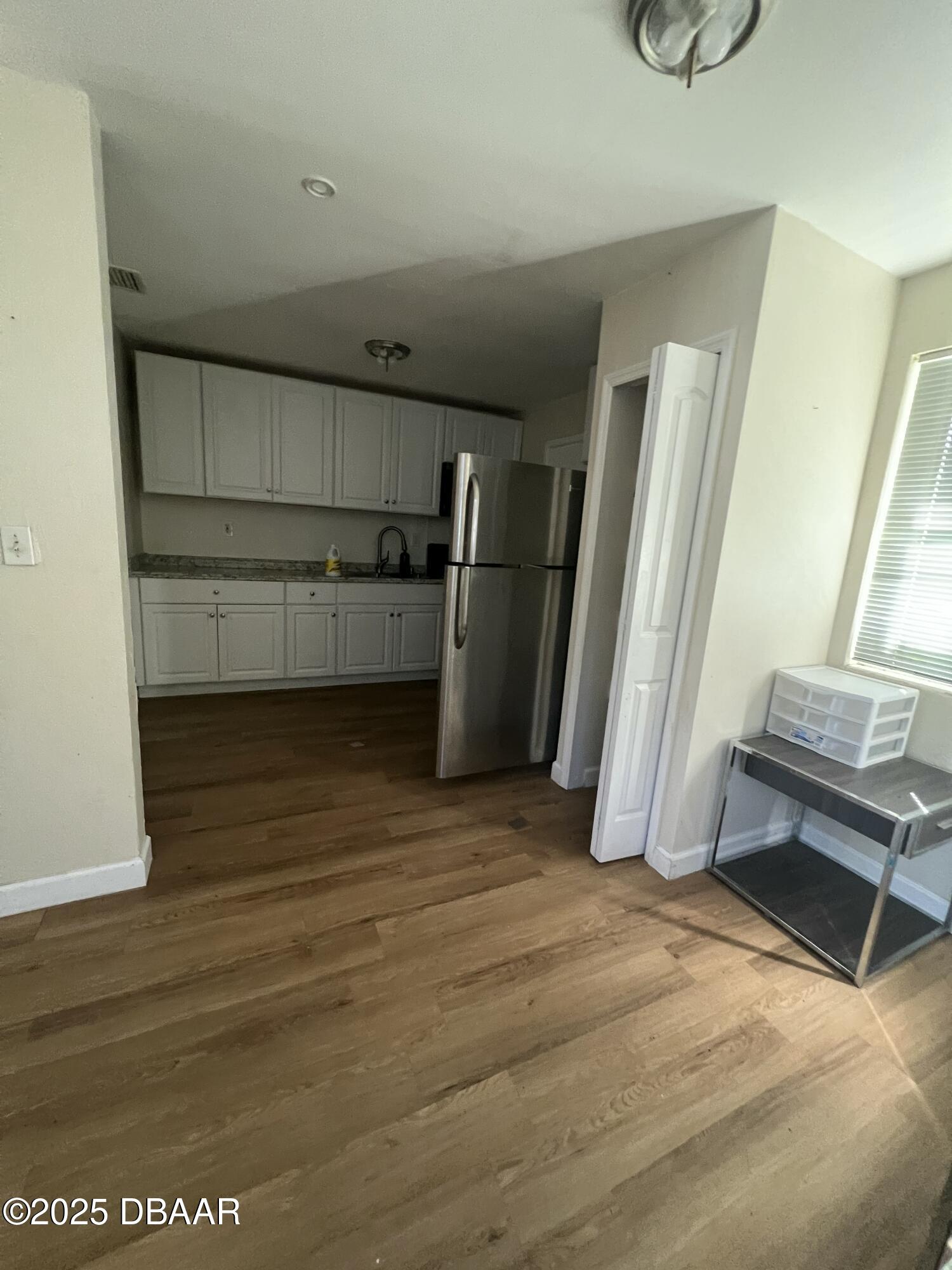 536 Ruth Street Daytona Beach, FL 32114 - Photo 7 of 10 a view of a room with storage and racks