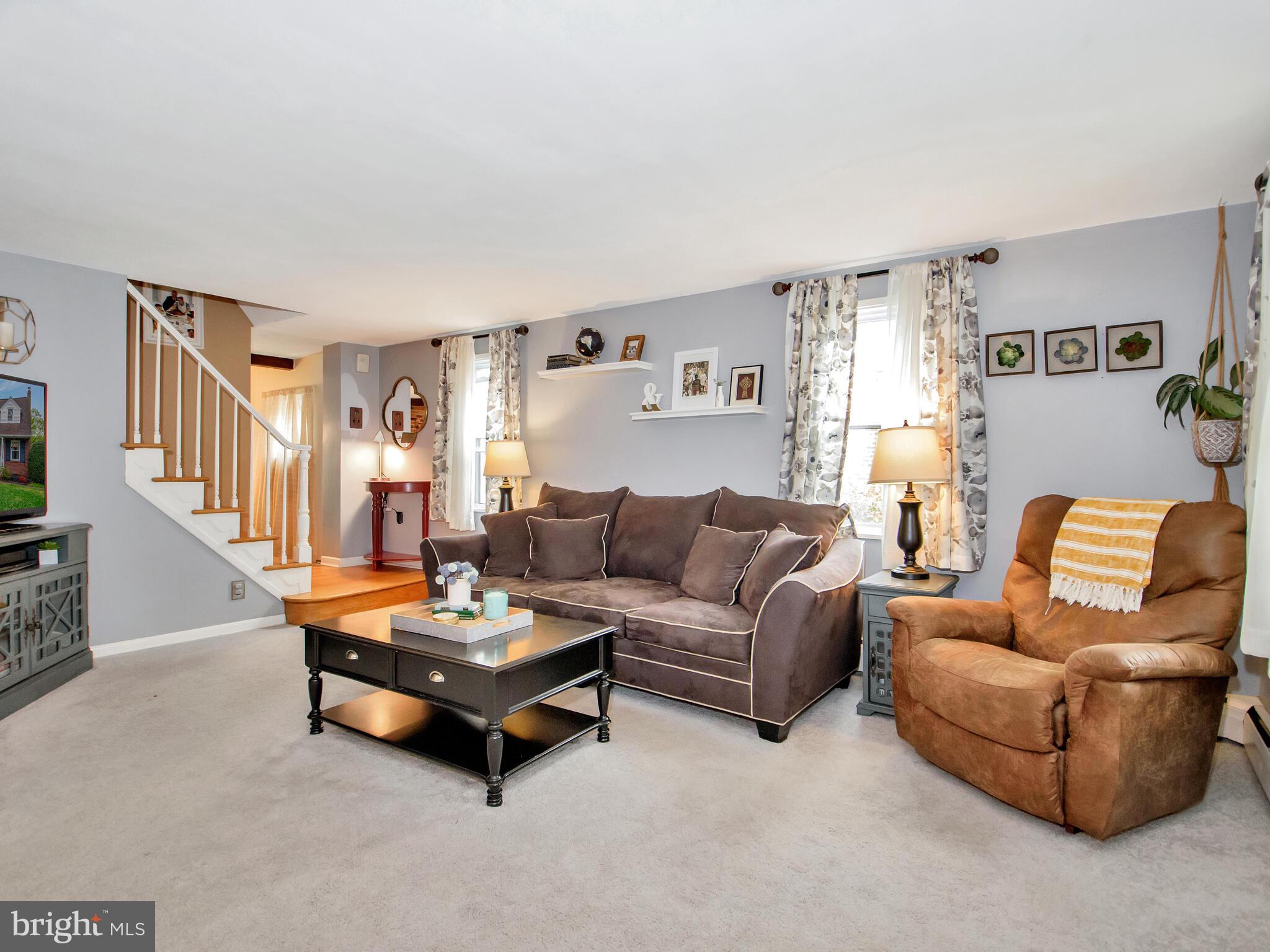 212 Valley View Road Media, PA 19063 - Photo 5 of 28 Living room - hardwood floors under carpet