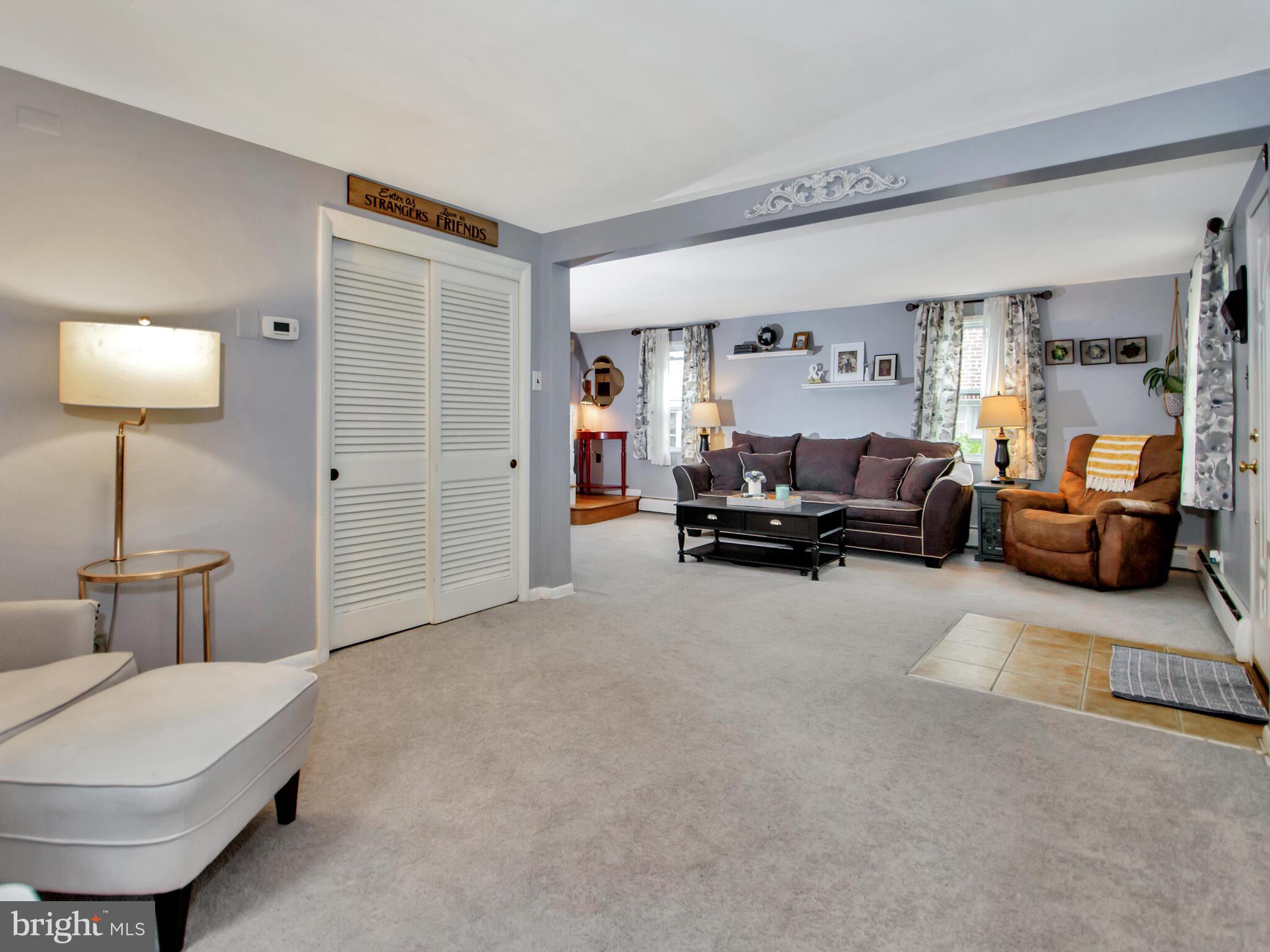 212 Valley View Road Media, PA 19063 - Photo 6 of 28 Living room - hardwood floors under carpet