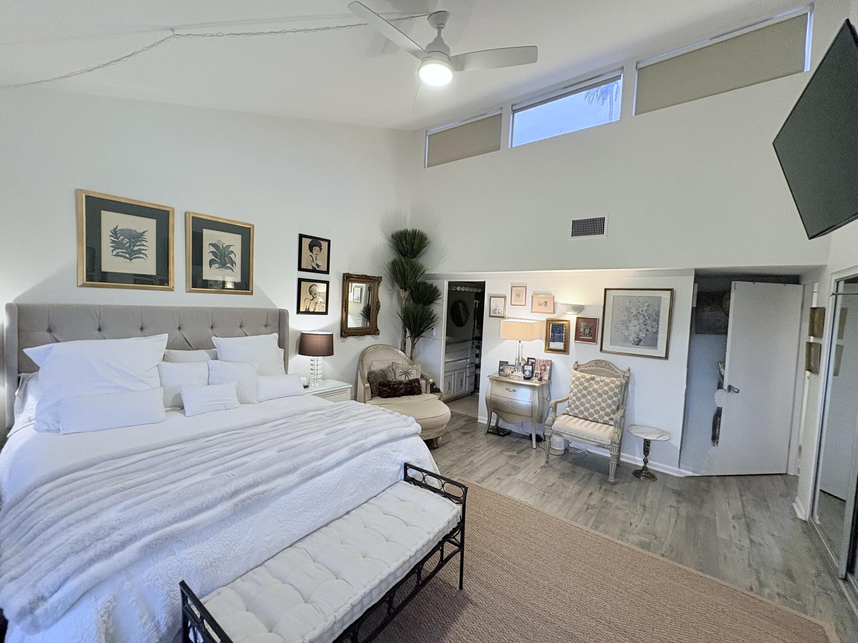 35082 Mission Hills Drive Rancho Mirage, CA 92270 - Photo 14 of 31 a bedroom with a large bed and furniture