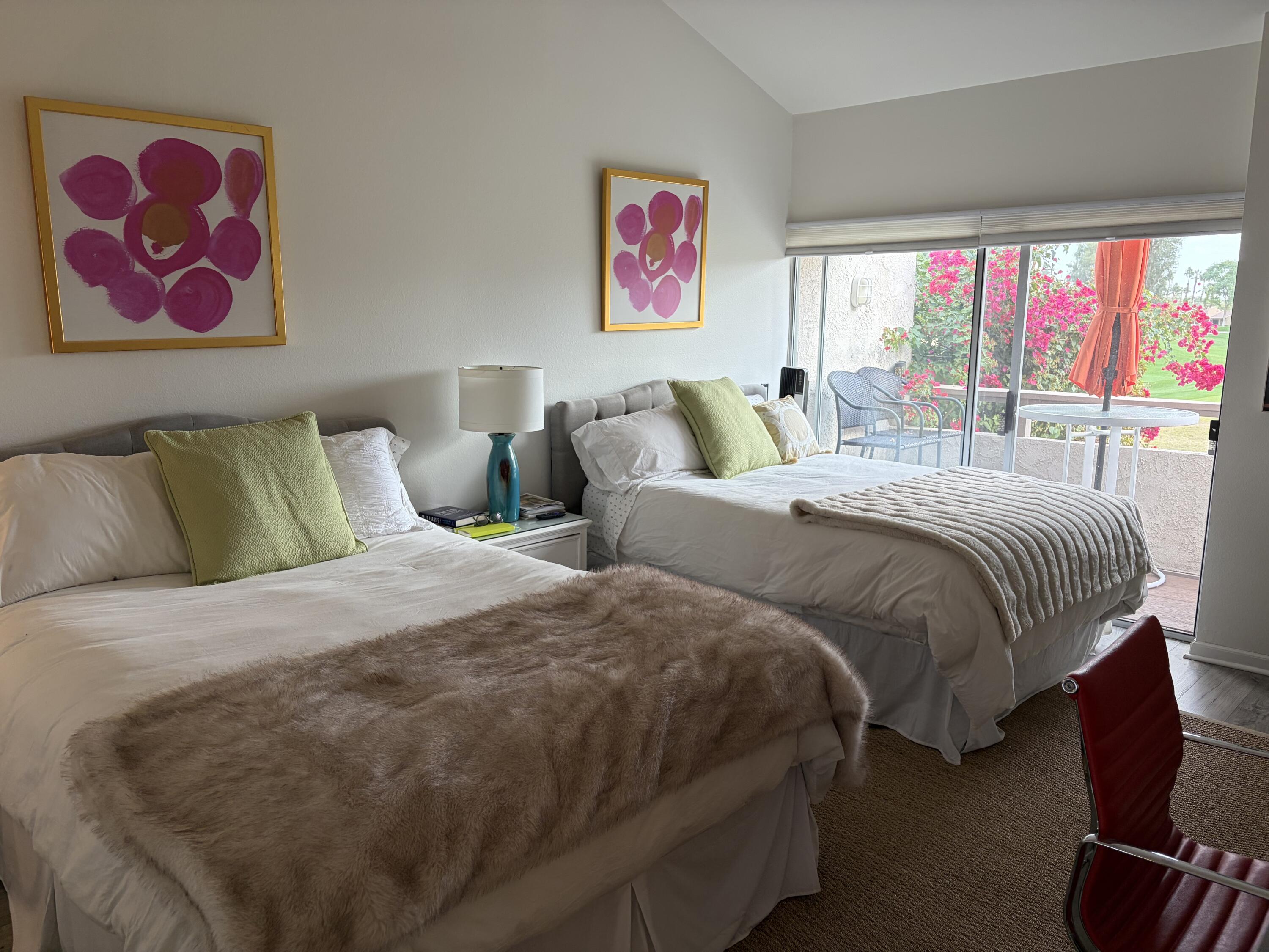 35082 Mission Hills Drive Rancho Mirage, CA 92270 - Photo 19 of 31 a bedroom with two beds and a large window