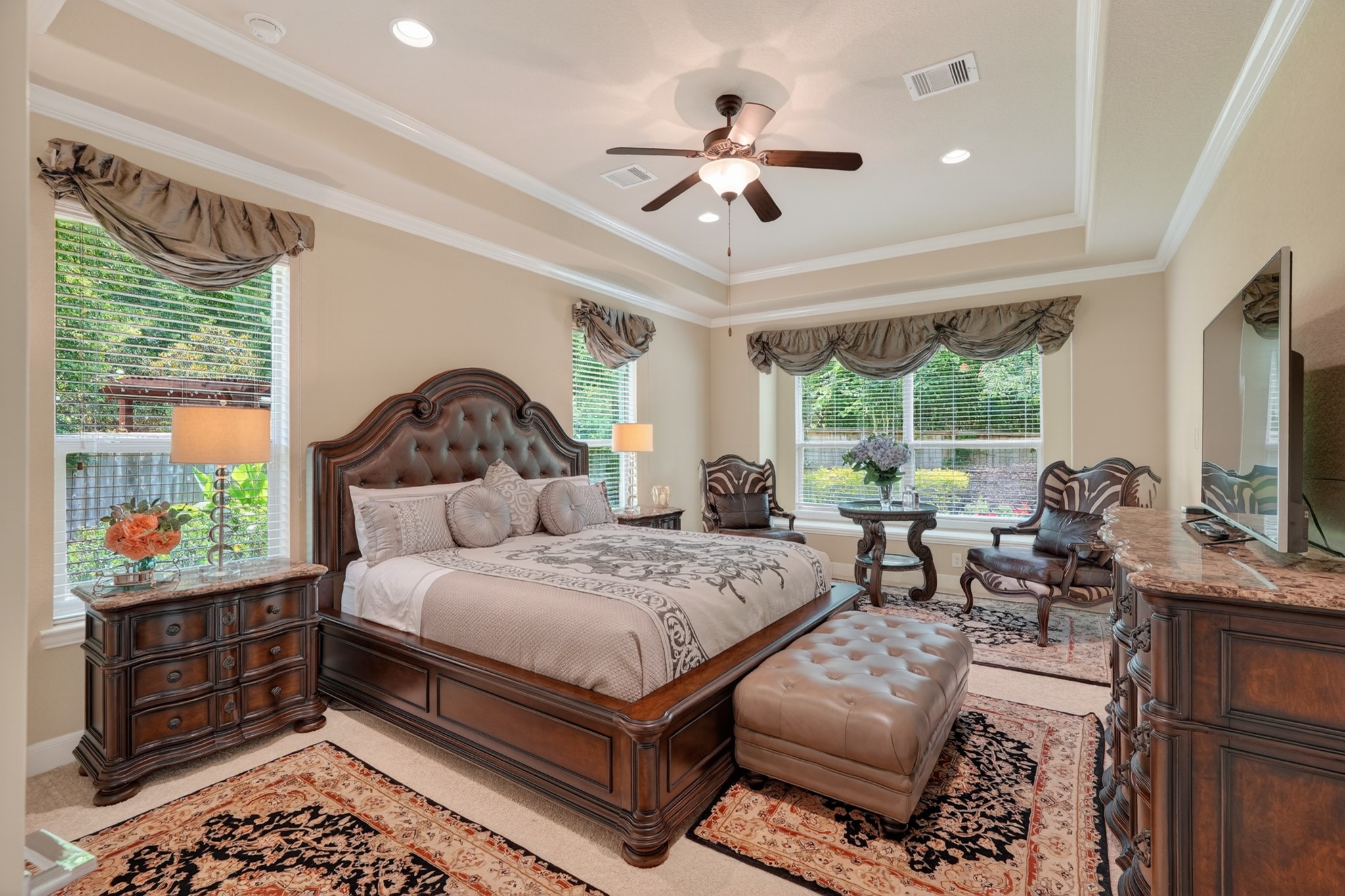 55 South Victoriana Circle Spring, TX 77389 - Photo 23 of 40 a bedroom with a bed window and flat screen tv