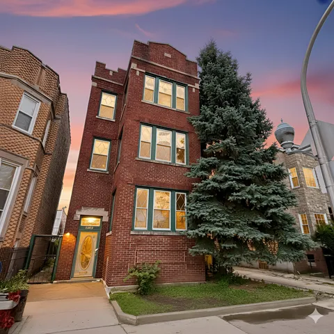 a front view of a multi story residential apartment building