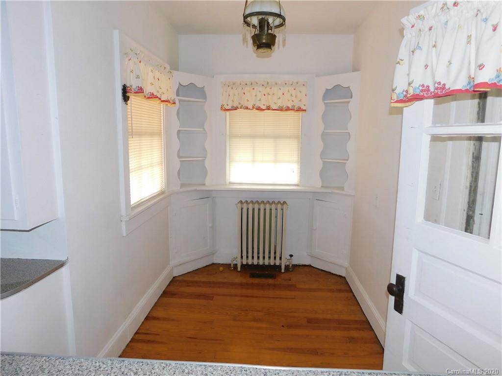 1382 Springdale Road, Unit 7 Lancaster, SC 29720 - Photo 11 of 31 a room with wooden floor and window