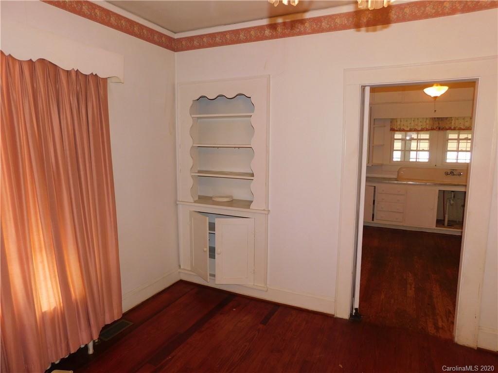 1382 Springdale Road, Unit 7 Lancaster, SC 29720 - Photo 13 of 31 a view of empty room with wooden floor and fan