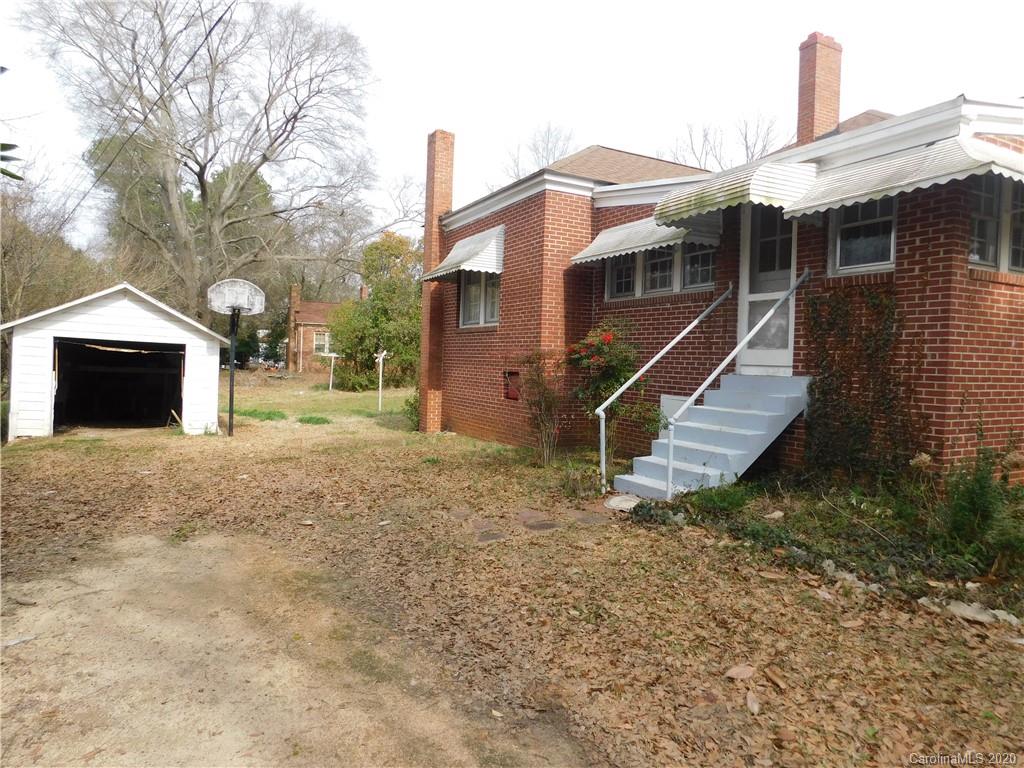 1382 Springdale Road, Unit 7 Lancaster, SC 29720 - Photo 3 of 31 a view of a house with a yard and a large tree