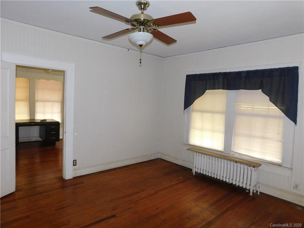 1382 Springdale Road, Unit 7 Lancaster, SC 29720 - Photo 22 of 31 a view of livingroom with hardwood floor and a ceiling fan